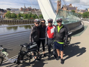 Group of cyclists on the Peace Bridge, Derry with Ireland by Bike