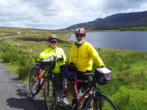 Cyclists resting at Lough Auva Glencolmcille County Donegal Ireland