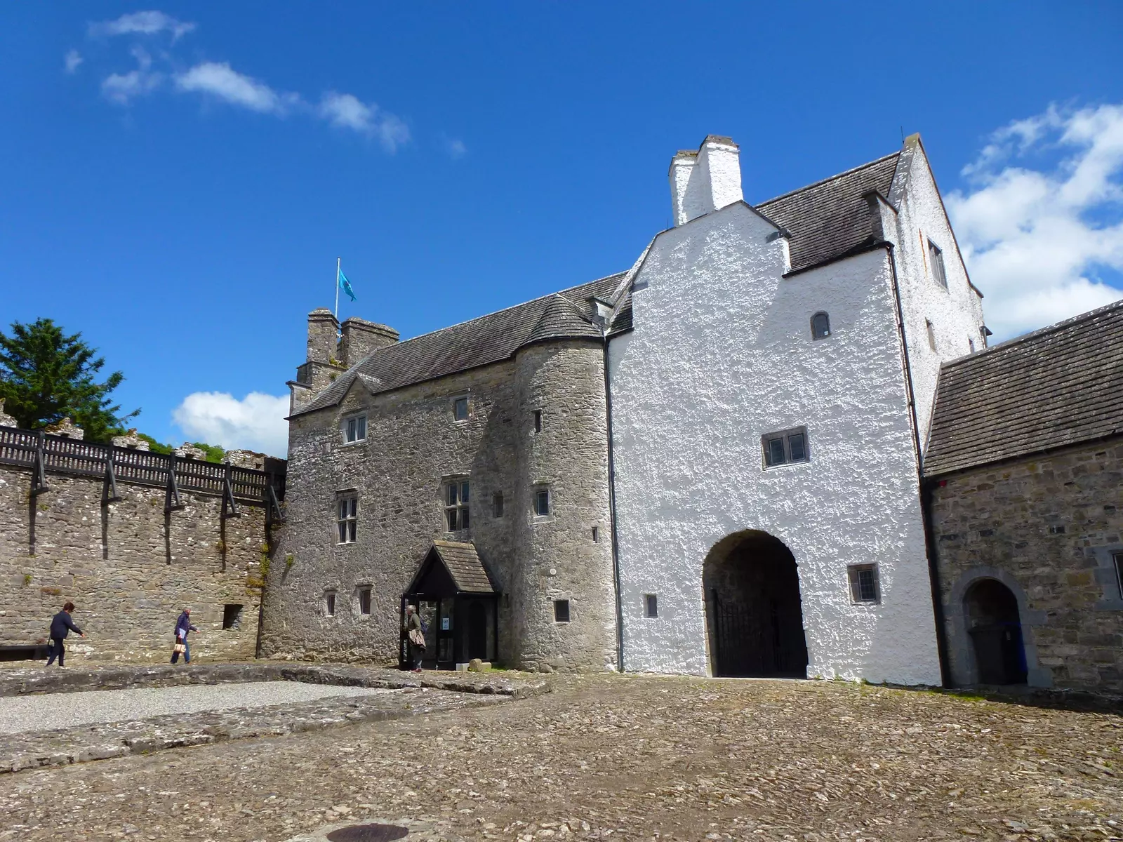 Castle courtyard with blue sky.